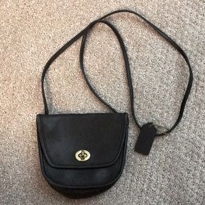Black Coach mini crossbody strap purse
